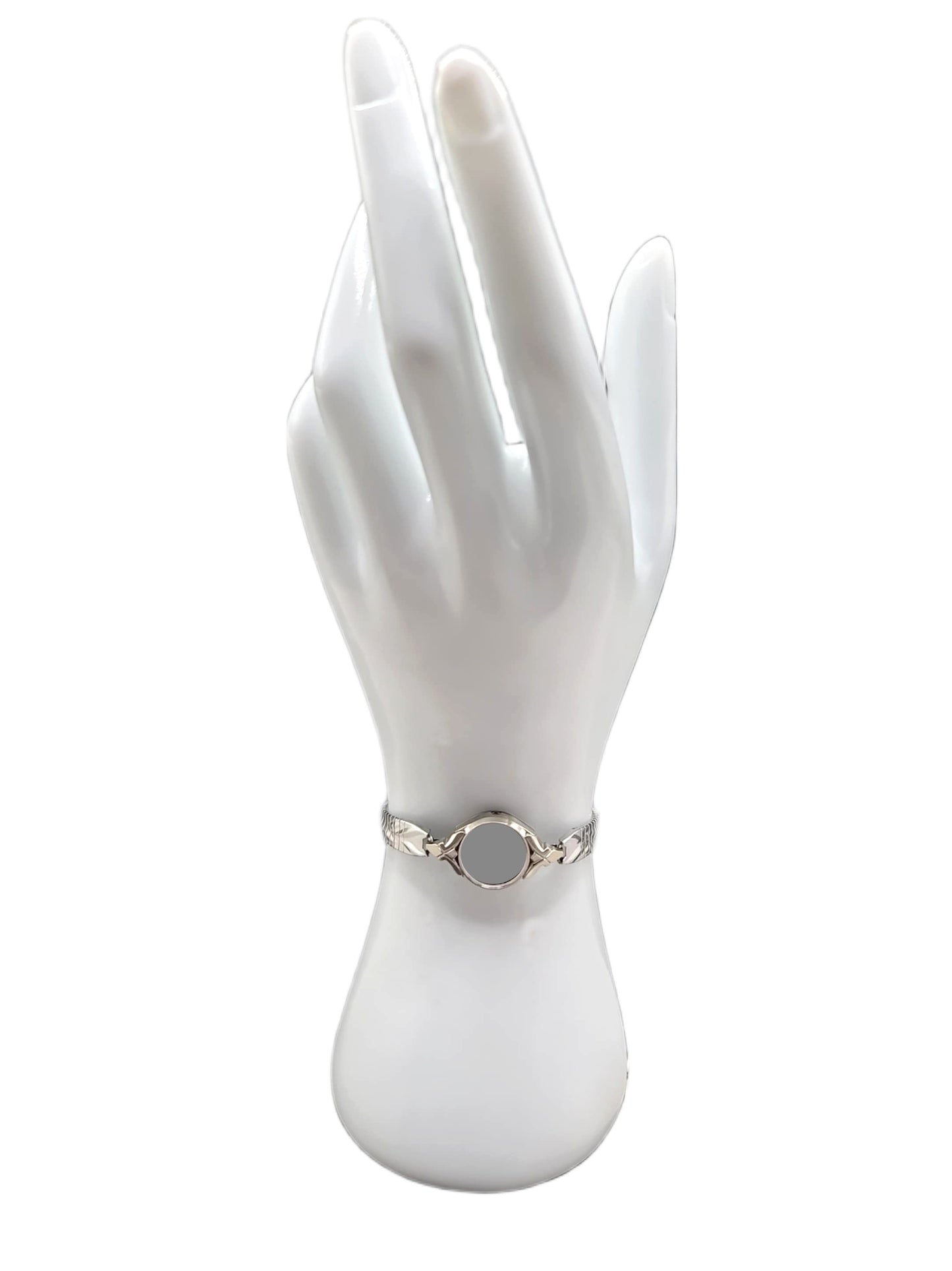 Stainless steel C type partial expansion band with easy to remove/add click together links.